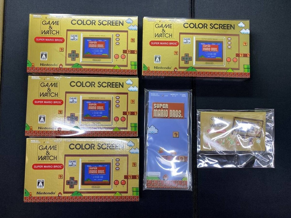Nintendo Game & Watch Super Mario Bros 4-Unit Set With Bonus Pin Badge and Phone