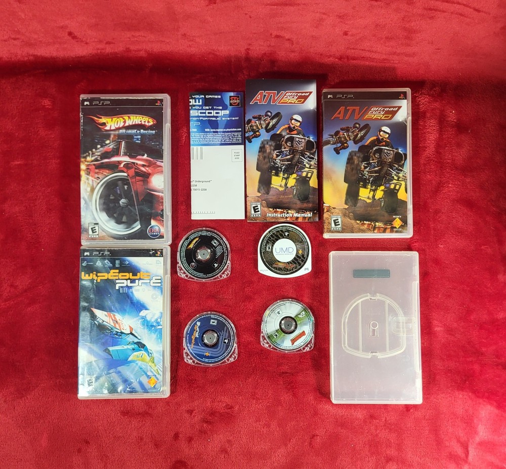 Wipeout Pure, Hot Wheels Ultimate, Burn Out Legends, & ATV Sony PSP – Lot of 4